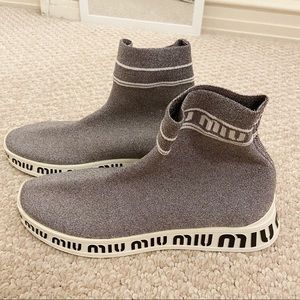 miumiu sparkling sliver boots.